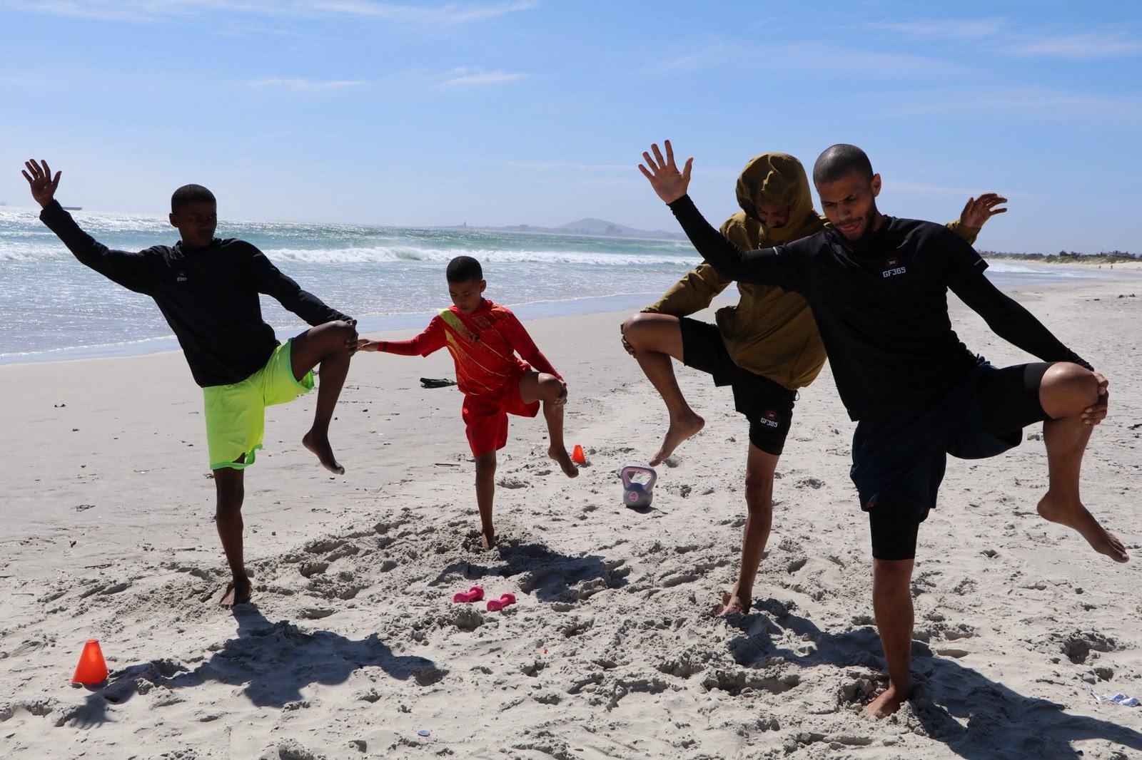 Balance and single-leg work on the sand